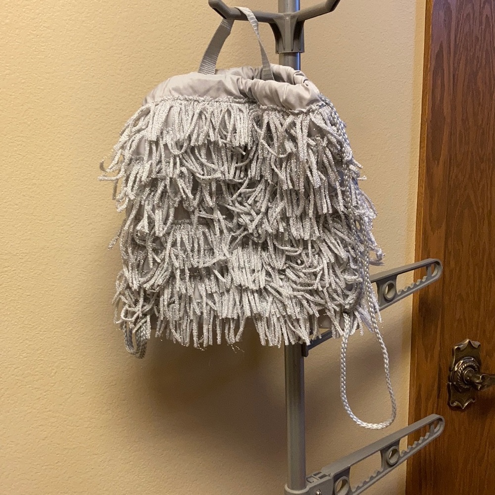 Cute frilly drawstring backpack with handle